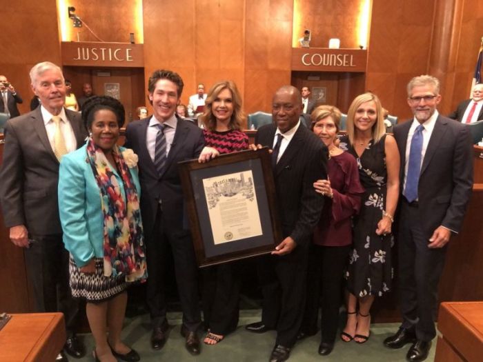 Lakewood Church Pastor Joel Osteen and his wife, Victoria, accept a proclamation from Houston Mayor Sylvester Turner for Lakewood's recovery efforts following Hurricane Harvey in Houston, Texas, August 14, 2018.
