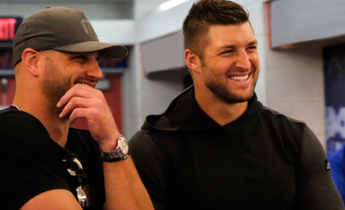 Robby Tebow, left, and Tim Tebow on the set of 'Run the Race.' The brothers serve as executive producers on their first film, which is in post-production.