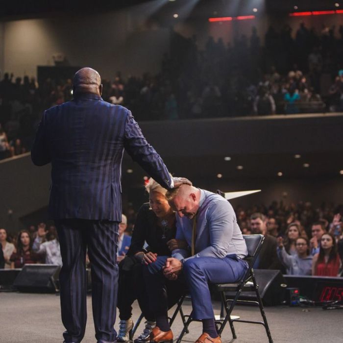 Megachurch pastor and televangelist, Bishop T.D. Jakes (L) blesses Pastor Ron Carpenter and his wife Hope, as they are officially installed as pastors of Redemption Bay Area church in San Jose, California, on Wednesday August 22, 2018.