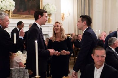 Paula White (center), spiritual adviser to President Donald Trump, and Jared Kushner (center left), a senior adviser to Trump and his son-in-law, attend an evangelical leaders dinner at the White House on Aug. 27, 2018.