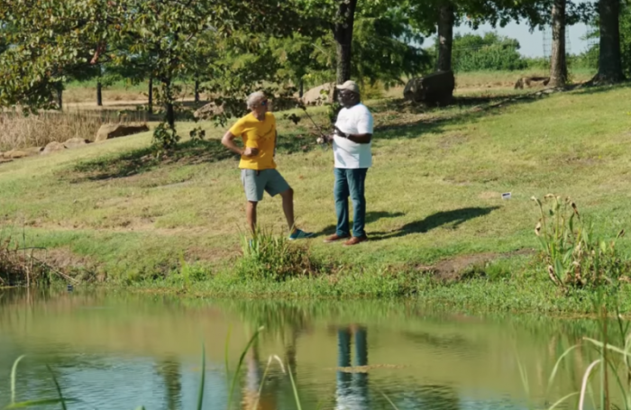 Bishop T. D. Jakes (R) fishes with Pastor Ed Young.