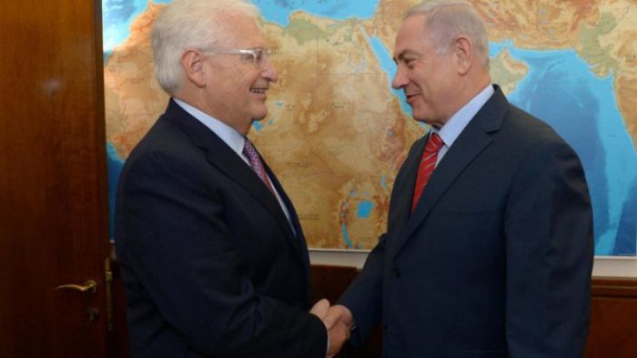 U.S. Ambassador to Israel David Friedman (left) greets Israeli Prime Minister Benjamin Netanyahu.