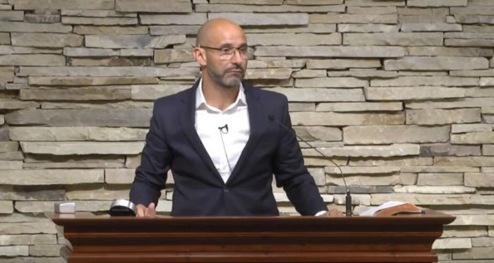 Pastor Gavin Peacock of Calgary Grace Church in Canada, giving remarks at Antioch Bible Church on Sept. 6, 2017.