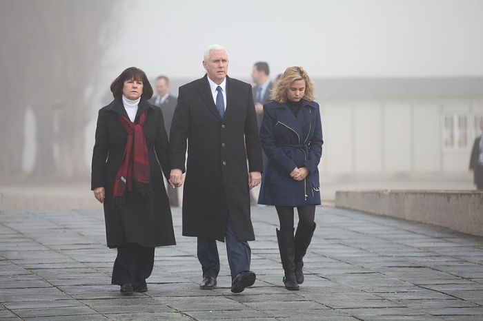 Vice President Mike Pence (M), Second Lady Karen Pence (L) and their middle child, Charlotte, tour Dachau Concentration Camp Memorial in Germany on February 19, 2017.
