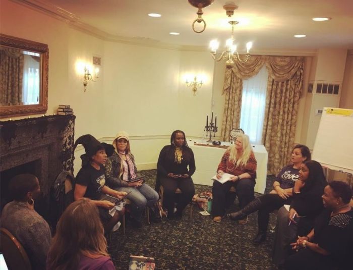 Christian witch Rev. Valerie Love (in hat) and a group of students at The Covenant of Christian Witches Mystery School in Salem, Mass., on October 1, 2018.