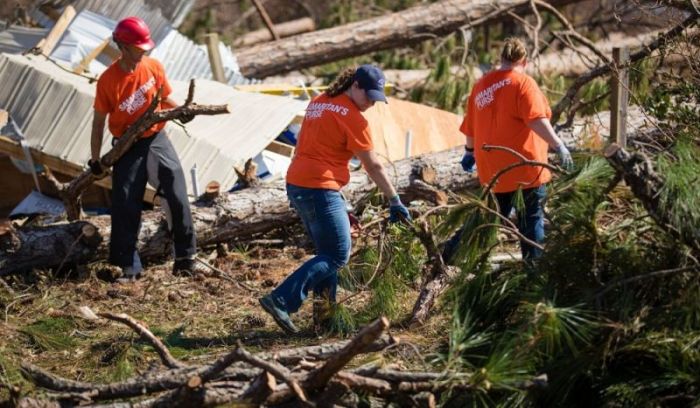Samaritan's Purse volunteers clear trees after Hurricane Michael in Mexico Beach, Florida in October 2018.