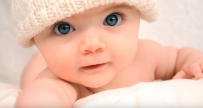 A baby girl appearing in ad from the Agenda Project urging people to stand with Planned Parenthood.