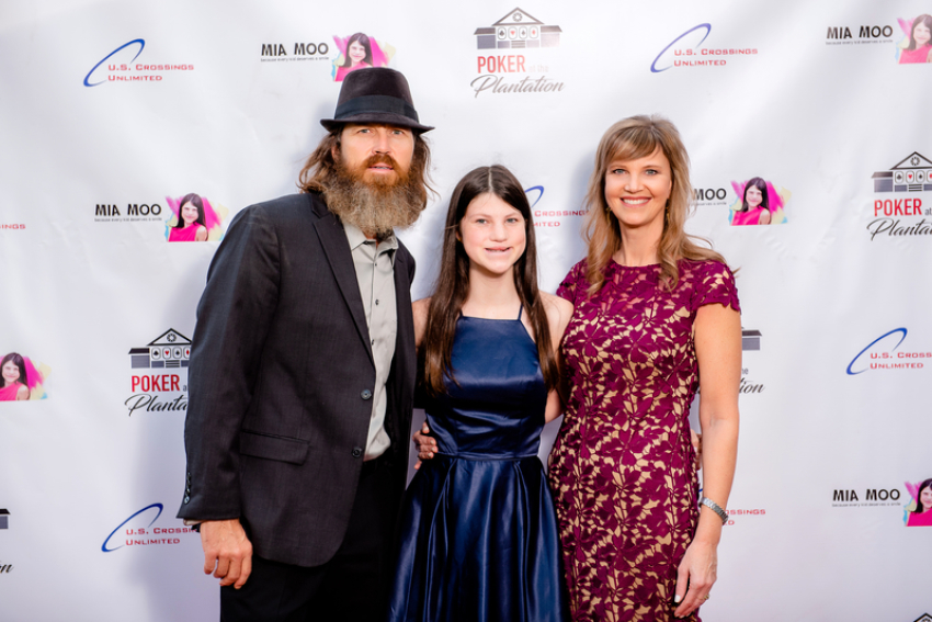 Jase, Missy, and Mia Robertson appear at the "Poker at the Plantation" fundraiser.