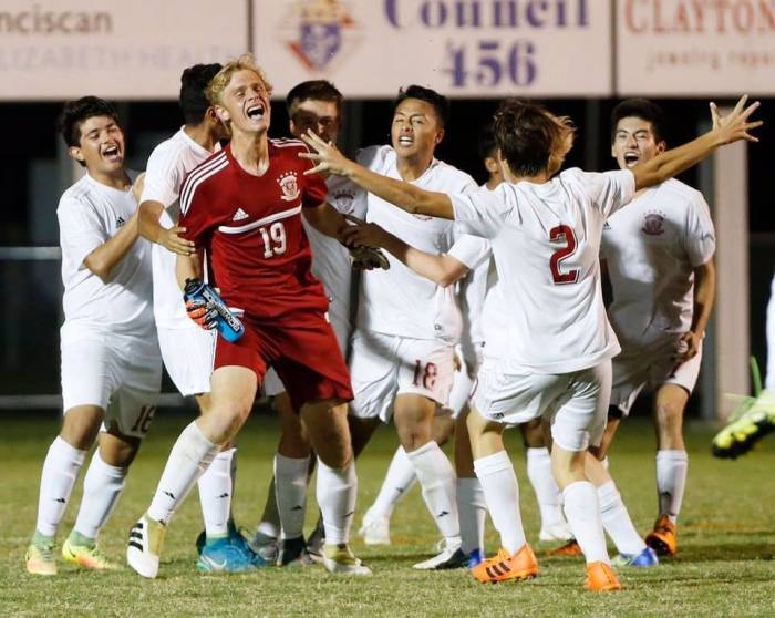 The late Cole Ungaro (in red) celebrates with his soccer team at Faith Christian School.