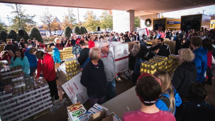 Volunteers gather the supplies needed for the Blessing Baskets compiled by volunteers at Cross Church, a multi-site megachurch based in Arkansas. 