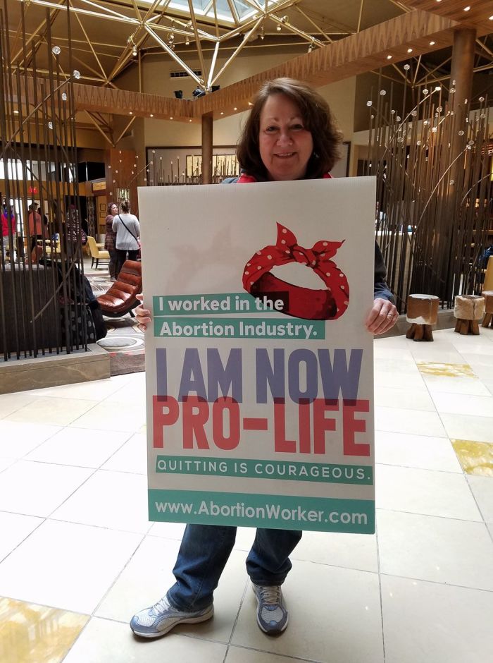 Sue Thayer holds up the sign she carried in the March for Life in Washington, D.C. on January 28, 2018. 