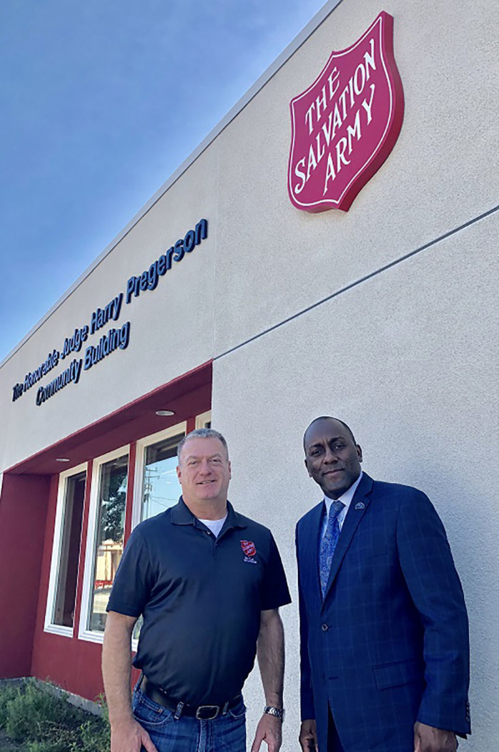 Caption:Steve Lytle, (L) director of The Salvation Army’s Bell Shelter, and Conrad Washington, the Deputy Director of the US Department of Veterans Affair’s Center for Faith and Opportunities Initiative, join forces. Nov. 3, 2018.