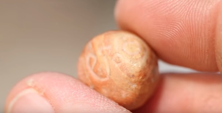 A tiny stone weight mentioned in the Old Testament and referred to as a "beka," which was recently discovered at an excavation in Jerusalem.