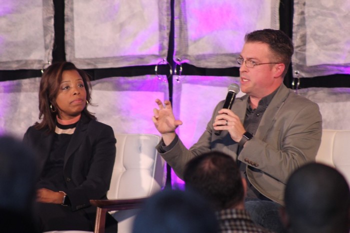 Rob Kelly (L), president of For Charlotte, speaks at the 100 Cities Summit hosted by Movement Day at the Museum of the Bible in Washington, D.C. on Nov. 29, 2018. To his right is Nicole Martin, the senior metro ministry mobilizer at the American Bible Society and founder of Soulfire International Ministries. 