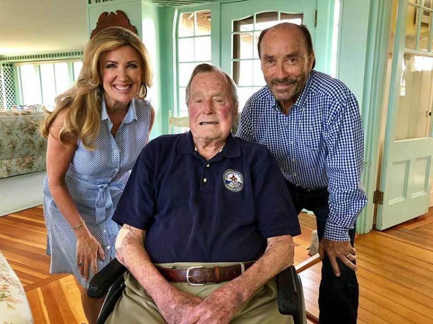 Kim Greenwood, former President George H.W. Bush, and Lee Greenwood. 