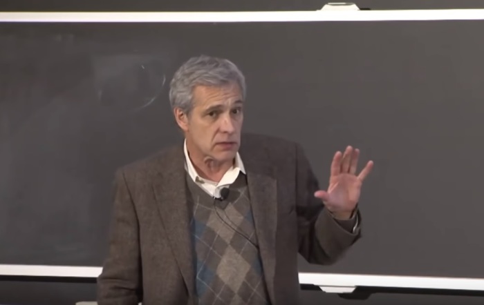 Stanford University neurobiologist William Hurlbut giving a presentation at the Veritas Forum event 'Drawing the Line: The Ethics of Gene Editing' held at the Massachusetts Institute of Technology in November 2018. 