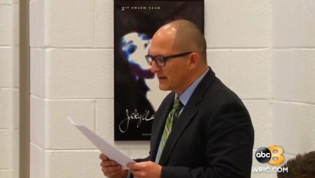 West Point High School French teacher Peter Vlaming reading from a prepared statement at a West Point School Board meeting held Thursday, December 6, 2018.