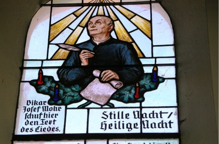 A stained glass image of Austrian priest Joseph Mohr (1792-1848), author of the lyrics for the famous Christmas carol "Silent Night."