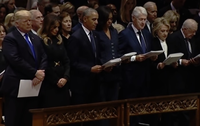 President Donald Trump, former presidents Barack Obama and Bill Clinton and their wives stand during the saying of the Apostles' Creed at George H.W. Bush's funeral at the Washington National Cathedral in Washington, D.C. on Dec. 5, 2018. 