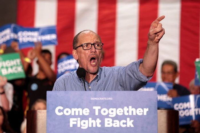 Tom Perez speaking with supporters at a 'Come Together and Fight Back' rally with U.S. Sen. Bernie Sanders of Vermont hosted by the Democratic National Committee at the Mesa Amphitheater in Mesa, Arizona on April 21, 2017. 