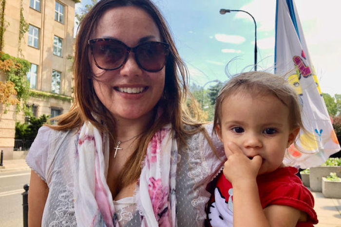 Silje Garmo and her daughter Eira outside the Polish Parliament in Warsaw in July 2018.