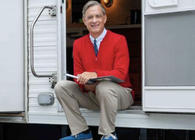 Tom Hanks dressed as Mr. Rogers on the set of 'A Beautiful Day in the Neighborhood.” 