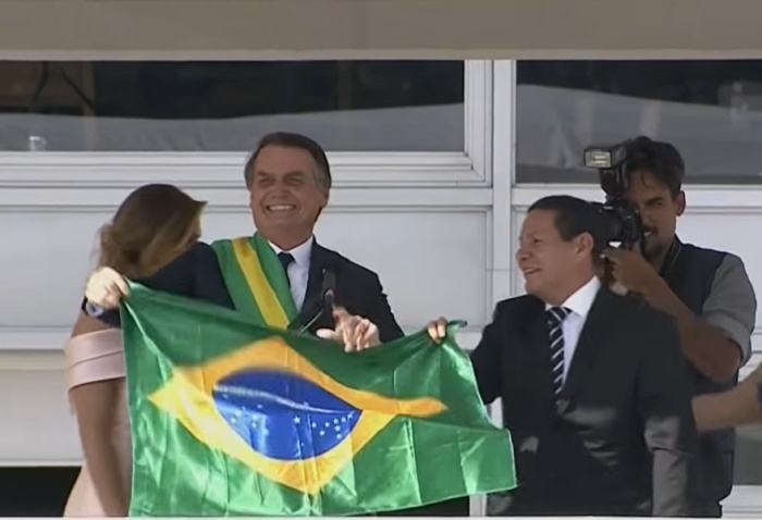 Jair Bolsonaro (L) becomes president of Brazil on January 1, 2019.
