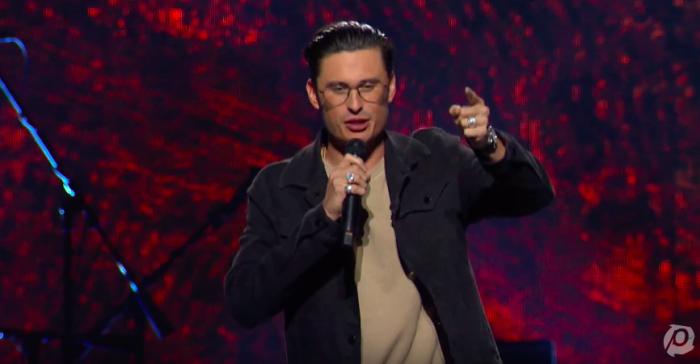 Chad Veach, pastor of Zoe Church in Los Angeles, California, addresses thousands of millennials gathered at Passion 2019 on Jan. 3, 2019.