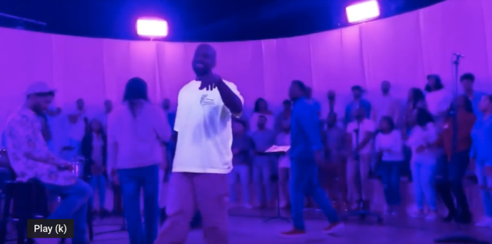 Kanye West joined by a gospel choir for his new concert series, Sunday Service.