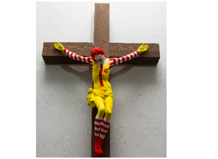 The artwork called “McJesus” was sculpted by Finnish artist Jani Leinonen and depicts a crucified Ronald McDonald.