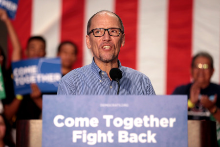 Democratic National Committee Chairman Tom Perez speaking with supporters at a 'Come Together and Fight Back' rally with Vermont Sen. Bernie Sanders, hosted by the Democratic National Committee at the Mesa Amphitheater in Mesa, Ariz.