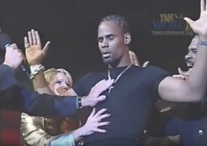 R Kelly gets prayed over by Dione Sanders, Paula White and Carvin Winans, video posted 2014.