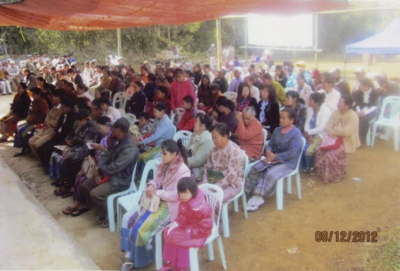 People attend the formal dedication of the first Rumai Palaung church in their community in Myanmar on Aug. 12, 2012.