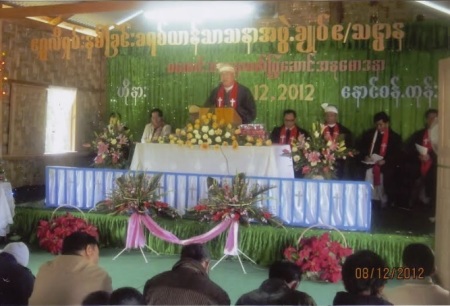 A leader speaks during the formal dedication of a Rumai Palaung church in Myanmar on Aug. 12, 2012.
