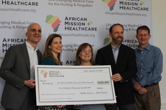 Medical missionary Dr. Rick Sacra (2nd R) and his wife, Debbie (C),, were honored with the Rabbi Erica and Mark Gerson L’Chaim (“To Life”) Prize for Outstanding Christian Medical Mission Service, along with a half-million dollar grant in New York City on Thursday, Jan. 31, 2019, in New York City. Mark Gerson (L) and his wife, Erica (2nd L), and Jon Fielder (R), co-founder of African Healthcare Mission which administers the prize, complete the photo.