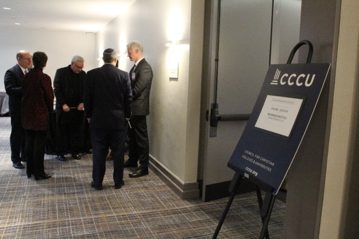 Presidents of religious colleges converse in the hallway of the Washington Court Hotel in Washington, D.C., during the 2019 Council for Christian Colleges and Universities Presidents Conference on Feb.1, 2019. 