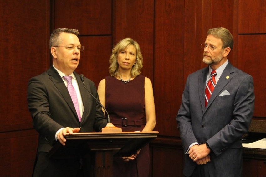 Pastor Andrew Brunson addresses a small group of legislators, their staffers, and USCIRF commissioners at the U.S. Capitol along with his wife, Norine, and USCIRF Commissioner Tony Perkins on Feb. 6, 2019.