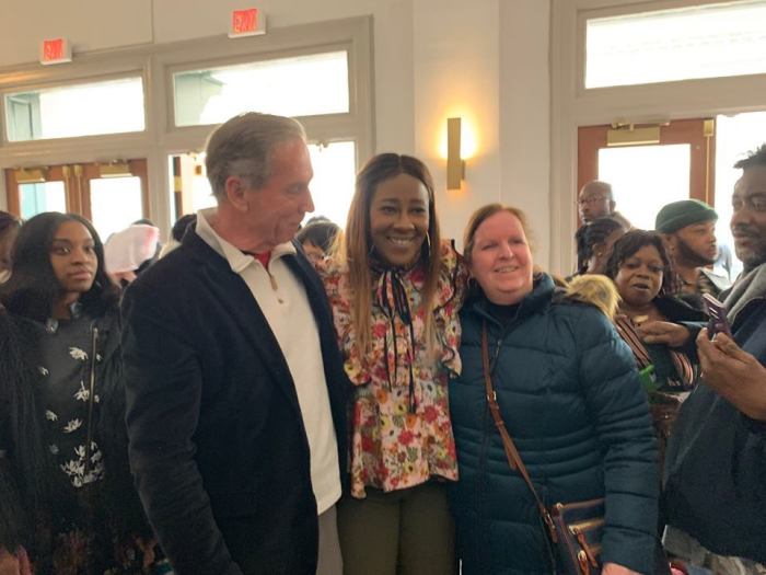 Gospel star Le'Andria Johnson (C) poses with representatives from the Women Walking in Victory Rehabilitation Center after testifying about her struggle with alcoholism at the new Met Philly church in Philadelphia, Pa., on Feb. 17, 2019.
