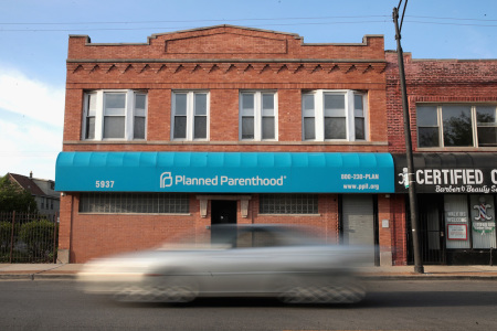 A motorist passes a Planned Parenthood clinic on May 18, 2018 in Chicago, Illinois.