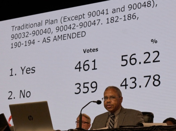 The Rev. Joe Harris presides over the legislative committee while the results of a vote approving the Traditional Plan as amended by 461-359 are displayed. The vote still needed to be approved by the plenary session on Feb. 26, the final day of the special session of the 2019 General Conference of The United Methodist Church in St. Louis, Missouri. 
