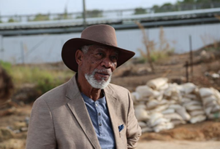 Morgan Freeman poses for a photo at Megiddo Prison in Israel.