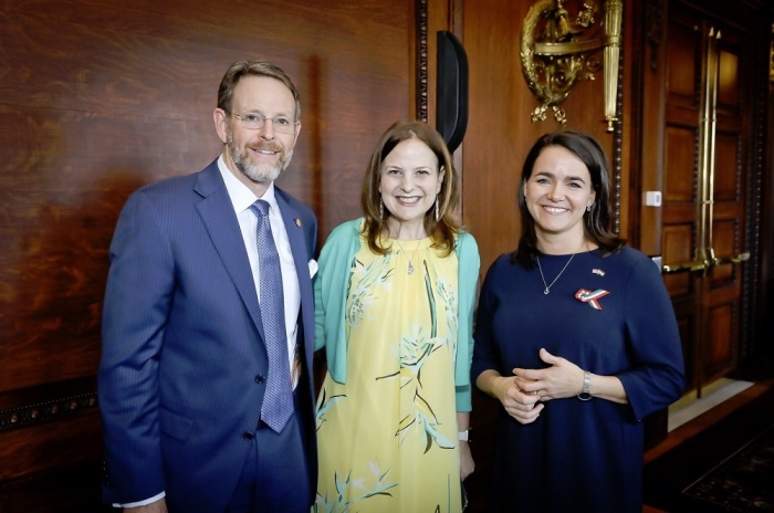 Family Research Council President Tony Perkins (L), White House adviser Kathryn Talento (M) and Hungary's Minister of State for family, youth and international affairs Katalin Novak (R) pose for a picture on the sidelines of the Making Families Great Again conference in Washington, D.C. on March 14, 2019.