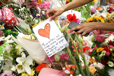 Flowers and messages are places on the steps of the Kilbirnie Mosque on March 17, 2019 in Wellington, New Zealand. 50 people are confirmed dead and 36 are injured still in hospital following shooting attacks on two mosques in Christchurch on Friday, March 15. The attack is the worst mass shooting in New Zealand's history. 