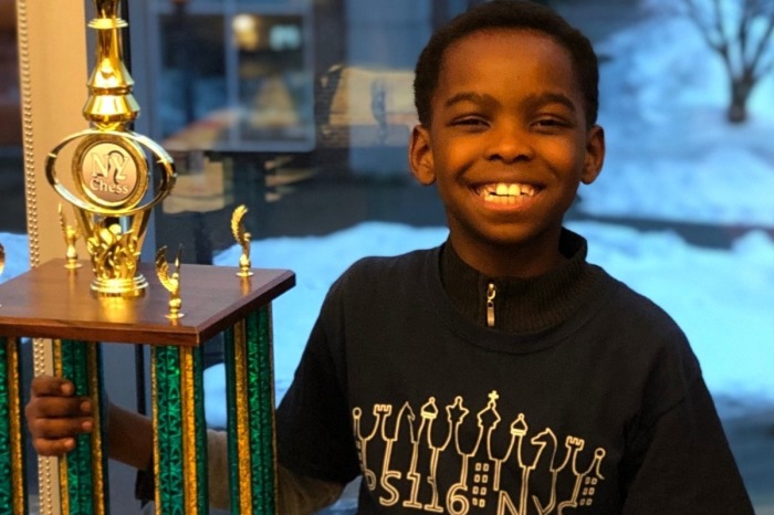 Christian refugee, Tanitoluwa Adewumi, 8, is New York State's primary chess champion.