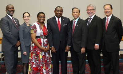Members of the United Methodist Judicial Council for 2016-2020 met briefly during General Conference 2016. From left are the Rev. Dennis L. Blackwell, Beth Capen, the Rev. J. Kabamba Kiboko, N. Oswald Tweh Sr., Ruben Reyes, the Rev. Øyvind Helliesen, and the Rev. Luan-Vu Tran of Lakewood, Calif. Not pictured are Deanell Reese Tacha and Lídia Romão Gulele.