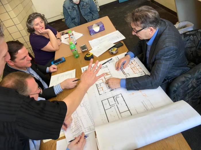 A group of architects and contractors sat with Pastor Paul Marzahn (not pictured) to discuss future plans for the Breakthrough Ministry Center in downtown Minneapolis on March 19, 2019.