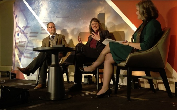 NASA astrophysicist Jennifer Wiseman (M) speaks during the BioLogos 19 conference at the Hyatt Regency in Baltimore, Maryland, on March 28, 2019. To her left is BioLogos Foundation President Deb Haarsma. To Wiseman's right sits astrobiologist Stephen Freeland. 