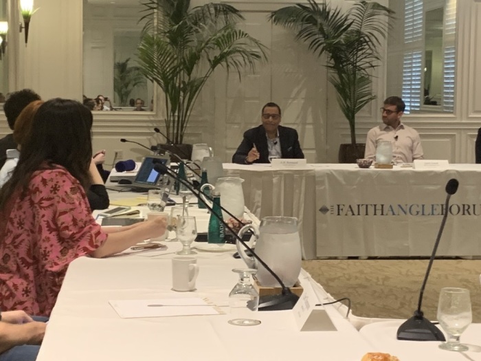 Pastor A.R. Bernard, Christian Cultural Center, New York City, (center) speaking at Faith Angle Forum, Miami Beach, Fla., April 2, 2019. 