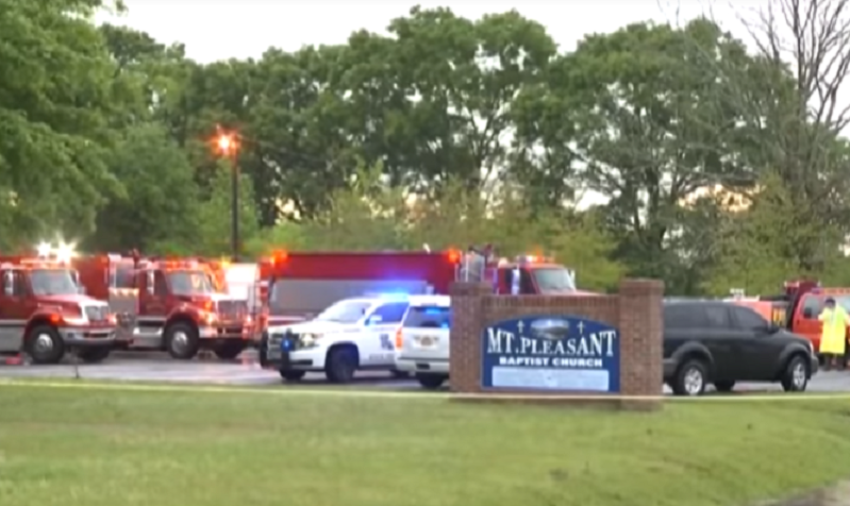 Fire officials outside Mt. Pleasant Baptist Church in Louisiana.