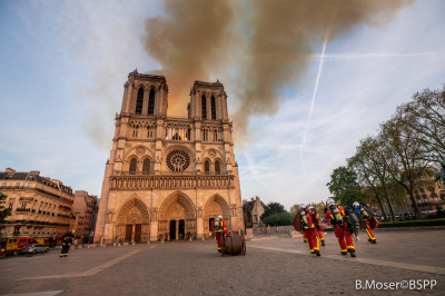 In this handout image provided by Brigade de sapeurs-pompiers de Paris, firefighters battle the blaze at Notre-Dame Cathedral on April 15, 2019, in Paris, France. A fire broke out on Monday afternoon and quickly spread across the building, collapsing the spire. The cause is yet unknown but officials said it was possibly linked to ongoing renovation work. 